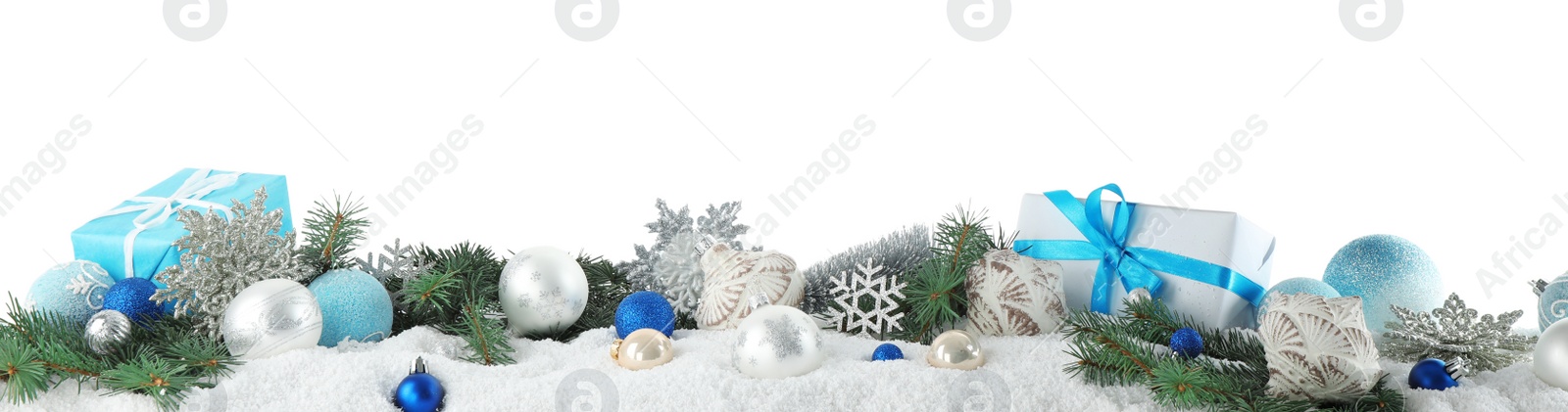 Photo of Fir branches, Christmas decoration and snow against white background