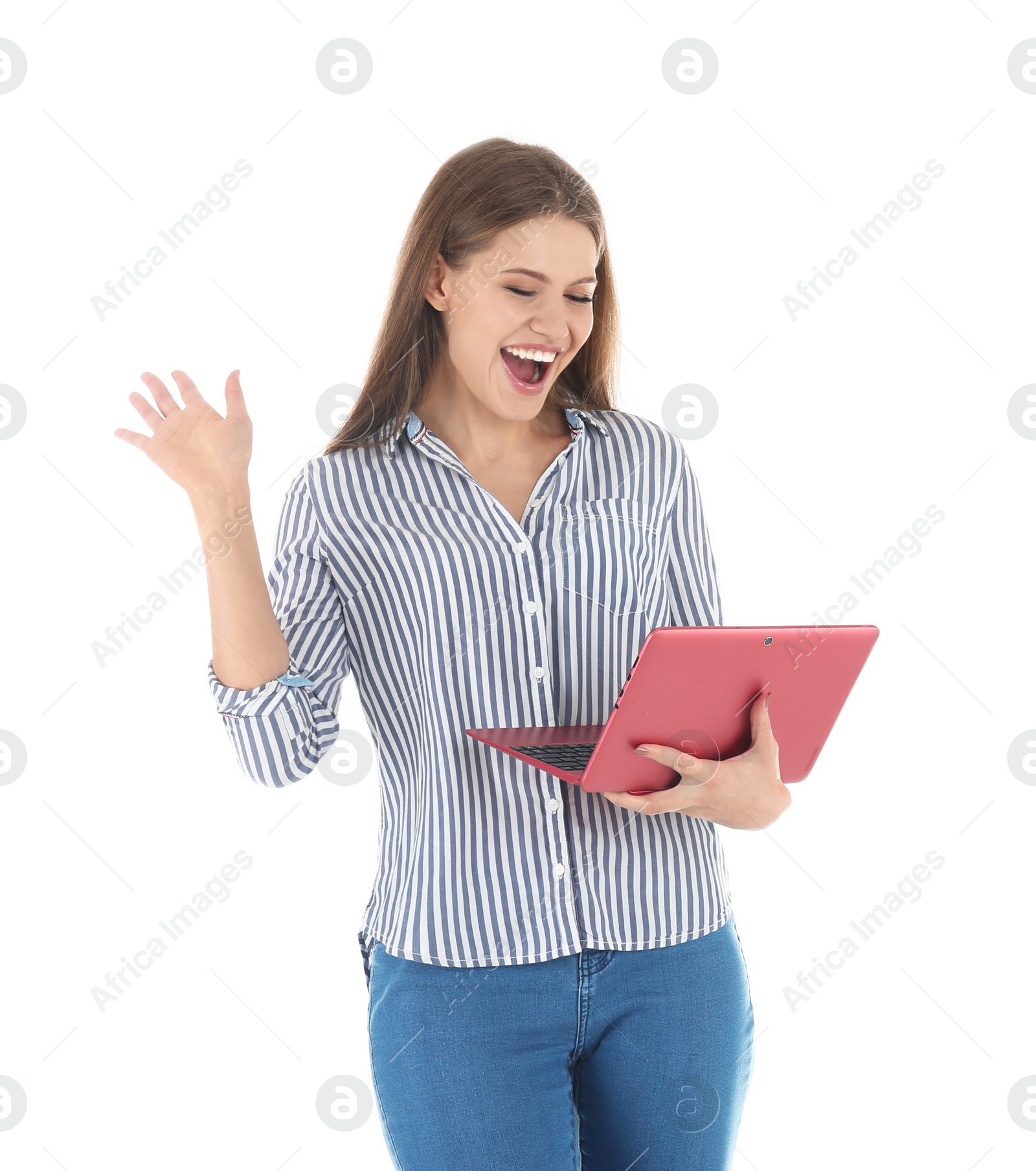 Photo of Emotional young woman with laptop celebrating victory on white background