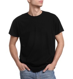 Young man wearing black t-shirt on white background, closeup