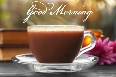 Image of Good morning! Glass cup with coffee on wooden table, closeup