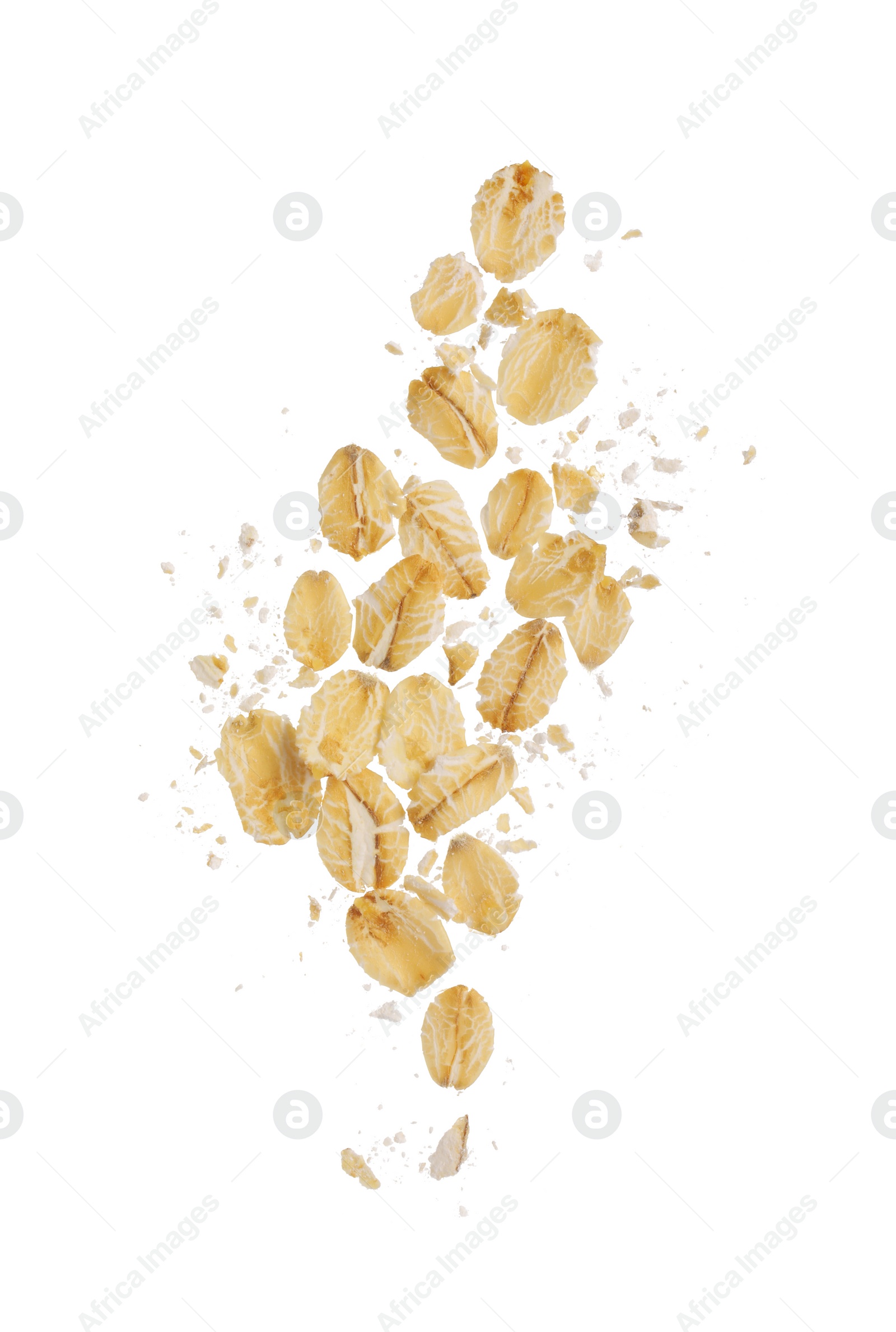 Photo of Dry oat flakes falling on white background