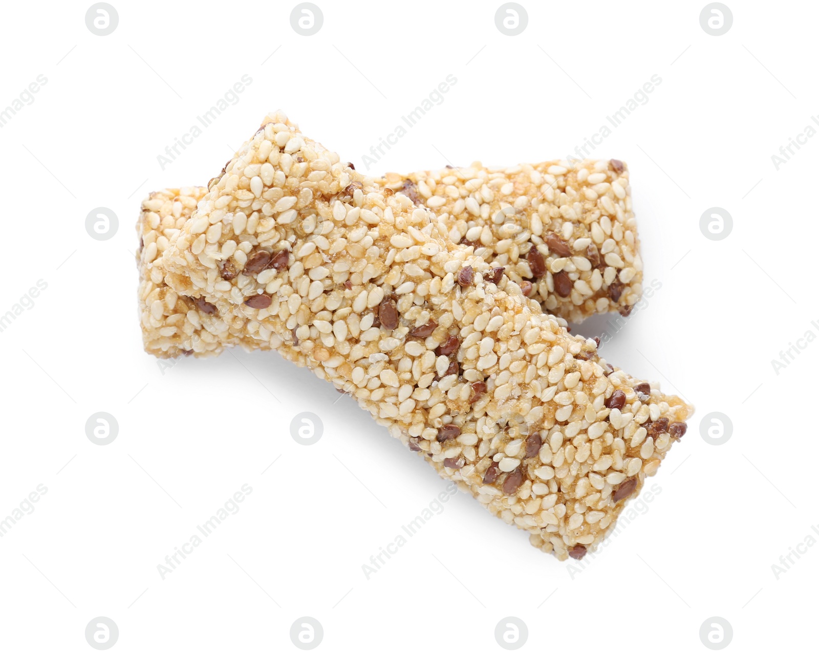 Photo of Tasty sesame seed bars isolated on white