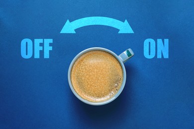 Coffee break. Cup of aromatic hot drink on blue background, top view