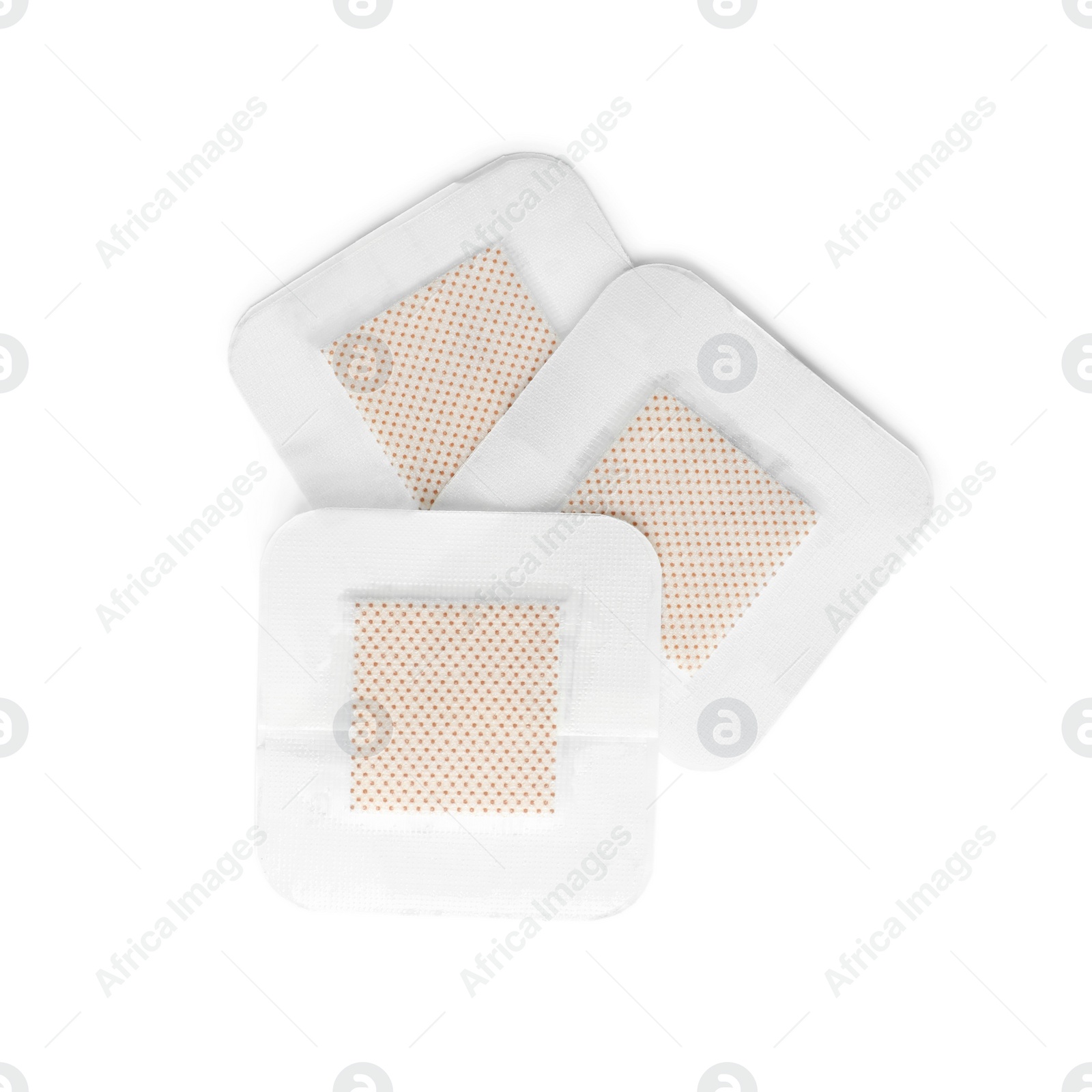 Medical sticking plasters isolated on white. First aid item Photo of Medical sticking plasters isolated on white. First aid item