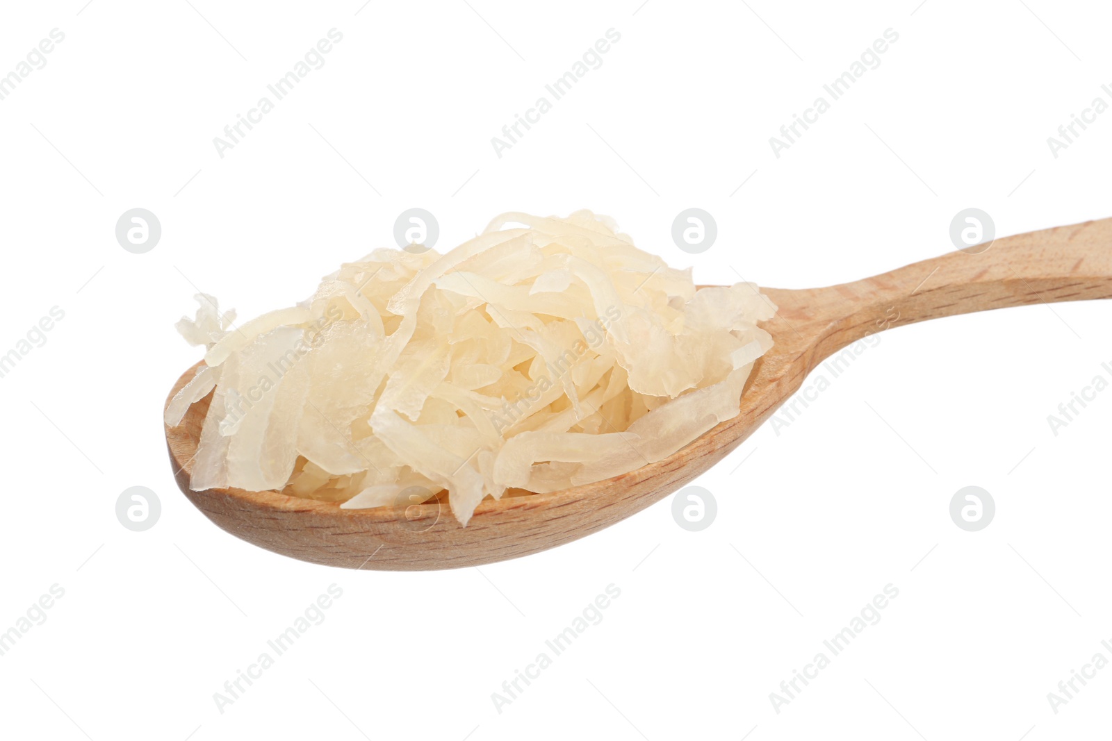 Photo of Wooden spoon of tasty fermented cabbage on white background