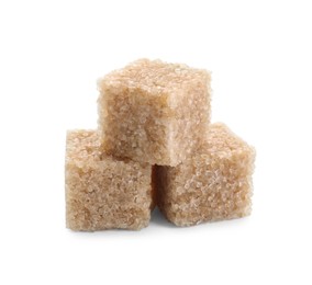 Photo of Three brown sugar cubes isolated on white