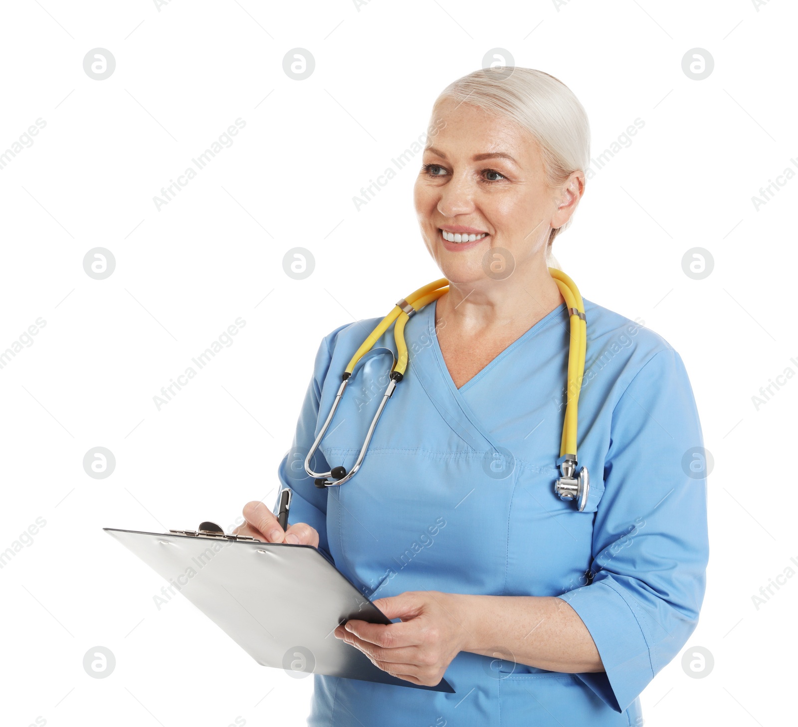 Photo of Portrait of female doctor in scrubs with clipboard isolated on white. Medical staff