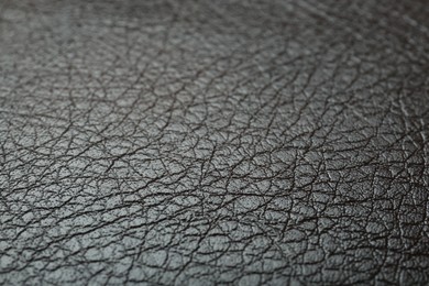 Texture of brown leather as background, closeup