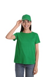 Photo of Young happy woman in green cap and tshirt on white background. Mockup for design