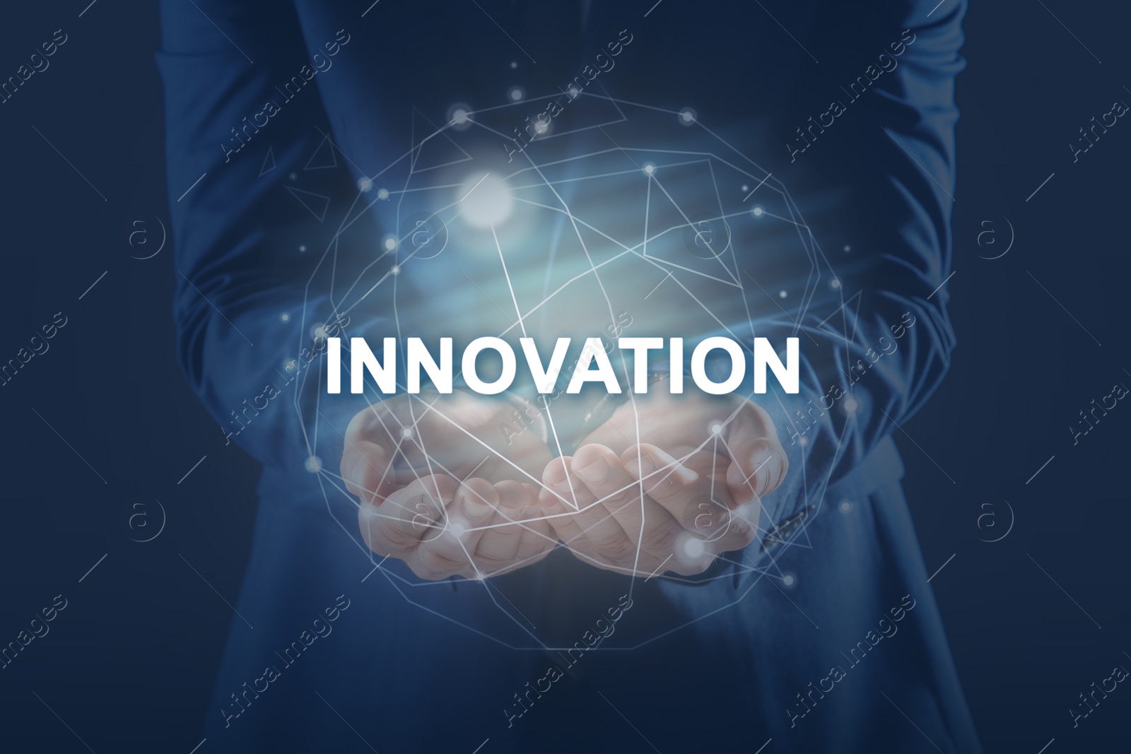 Image of Man holding digital word Innovation against blue background, closeup