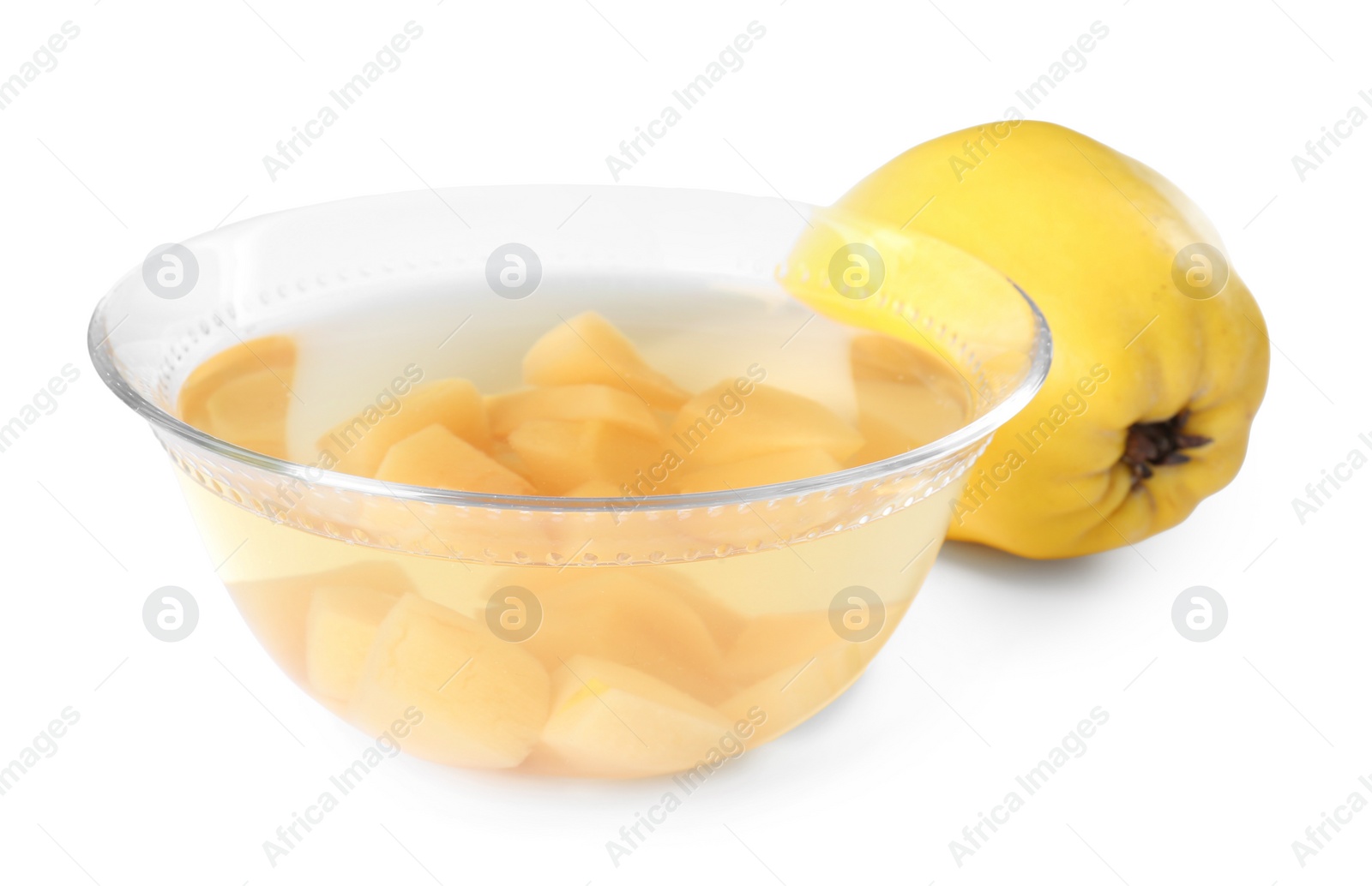 Photo of Delicious quince drink in glass bowl and fresh fruit isolated on white