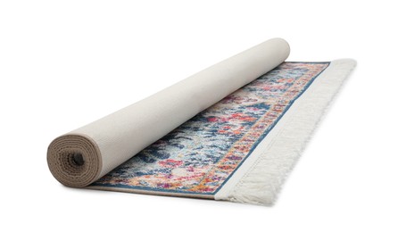 Rolled carpet with pattern on white background. Interior element