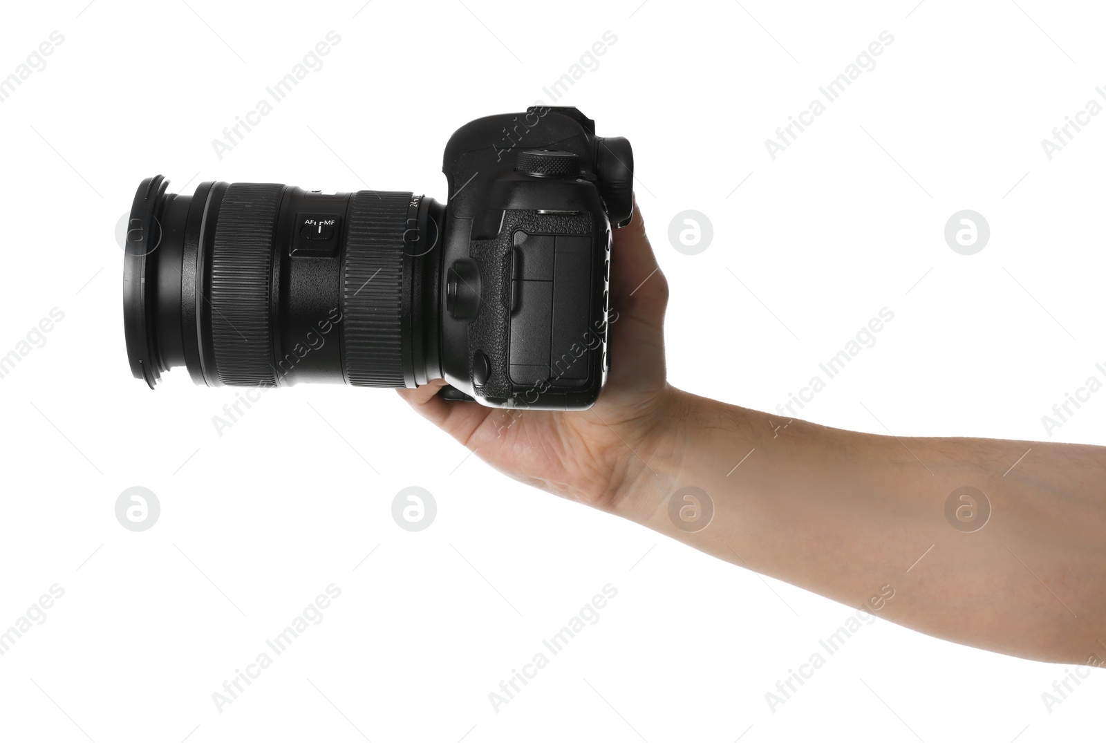 Photo of Photographer holding modern camera on white background, closeup