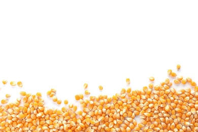 Photo of Raw corn kernels on white background. Healthy grains and cereals