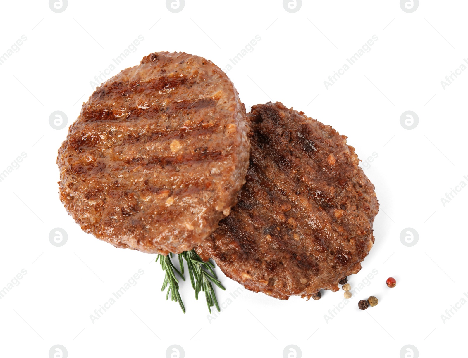 Photo of Grilled meat cutlets for burger isolated on white, top view