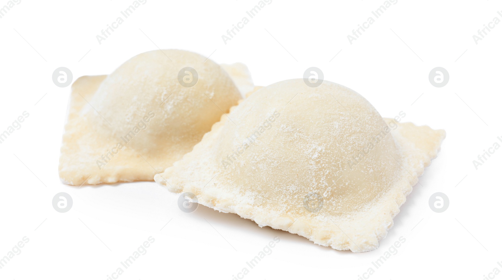 Photo of Uncooked ravioli with filling on white background