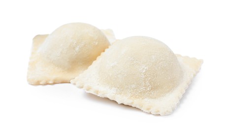 Photo of Uncooked ravioli with filling on white background