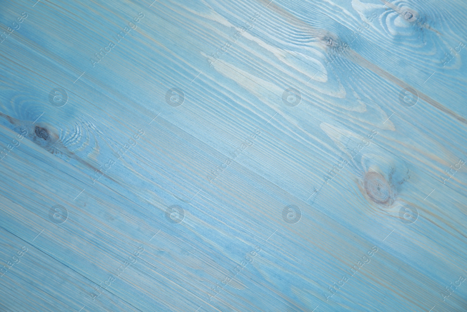 Photo of Light blue wooden surface for photography, top view. Stylish photo background