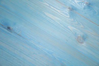 Photo of Light blue wooden surface for photography, top view. Stylish photo background