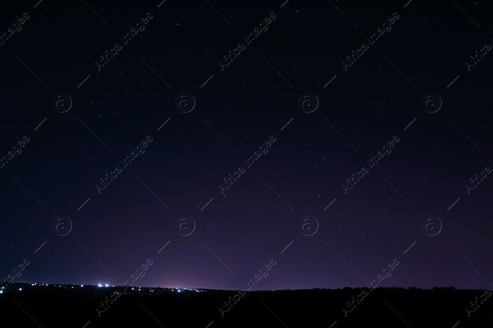 Photo of Beautiful view of starry sky over city at night