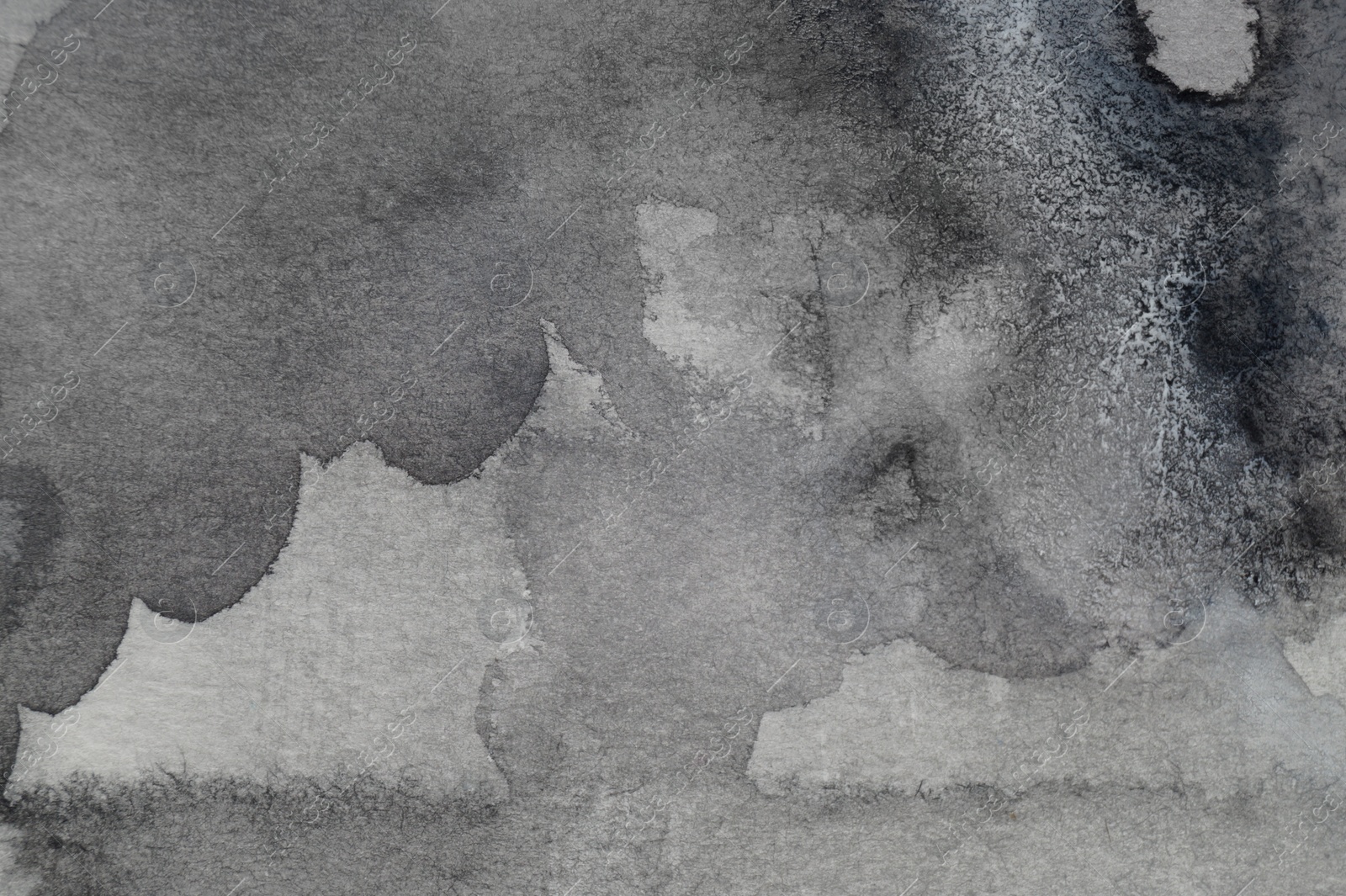 Photo of Abstract grey watercolor painting as background, top view