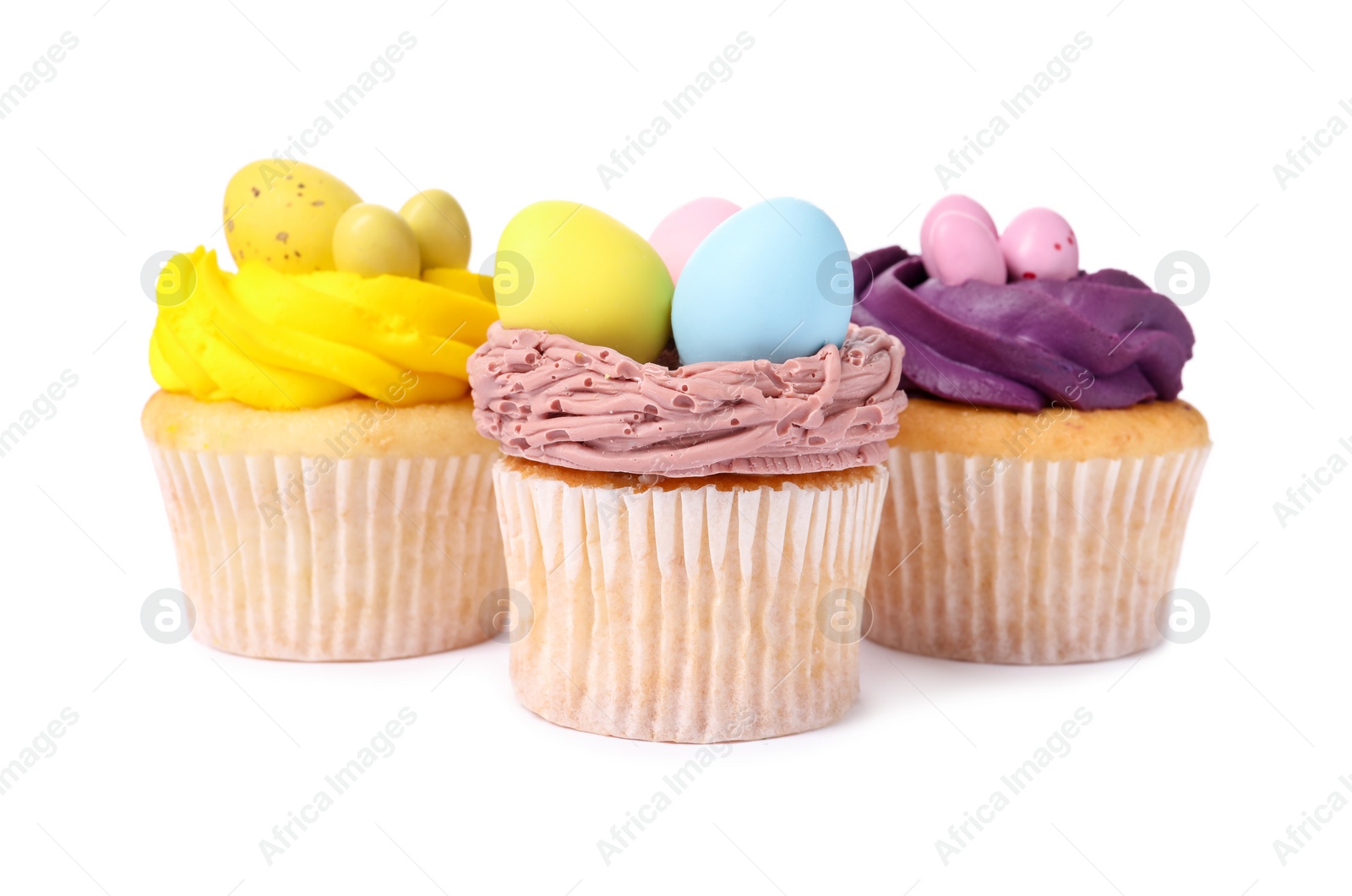 Photo of Tasty decorated Easter cupcakes isolated on white