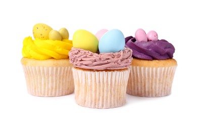 Photo of Tasty decorated Easter cupcakes isolated on white