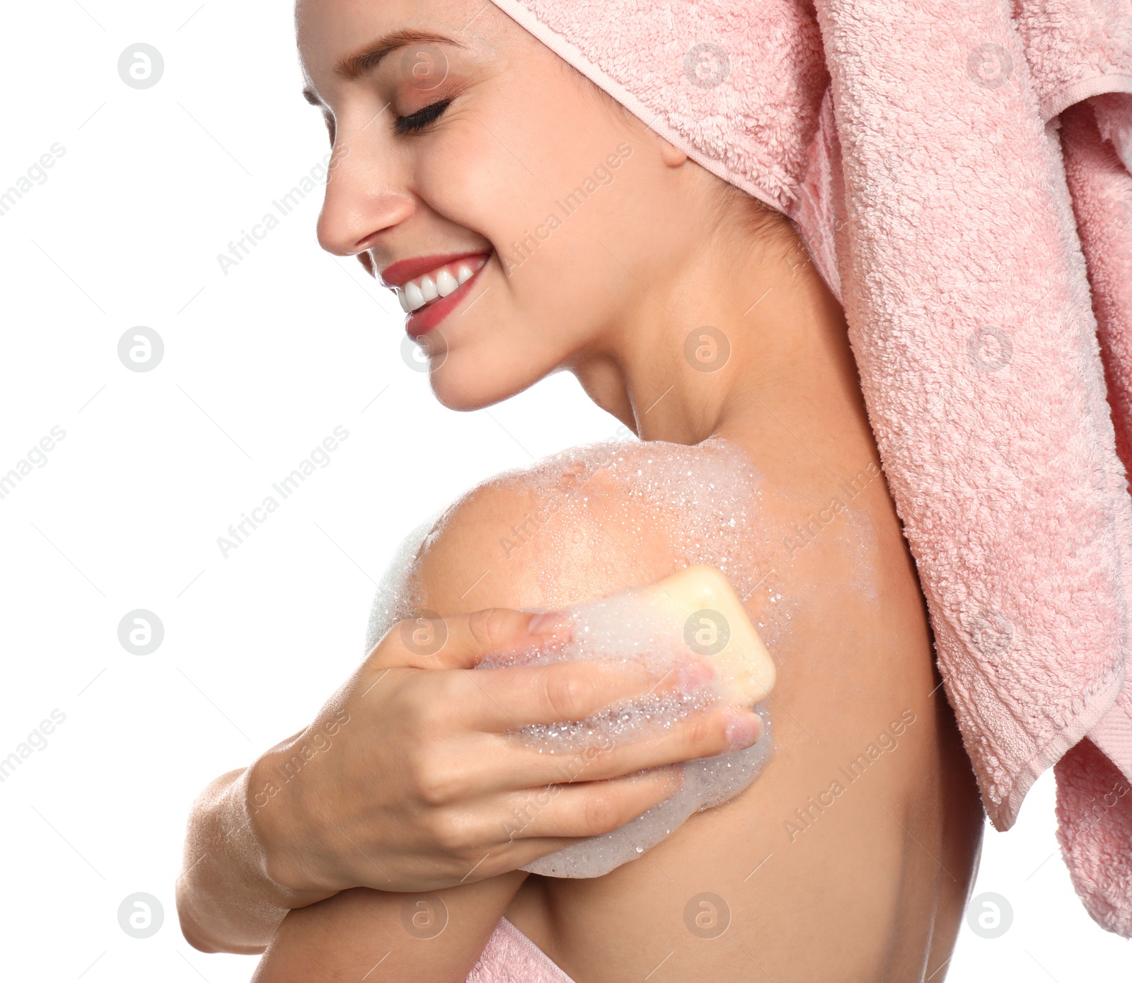 Image of Young woman washing body with soap bar on white background, closeup
