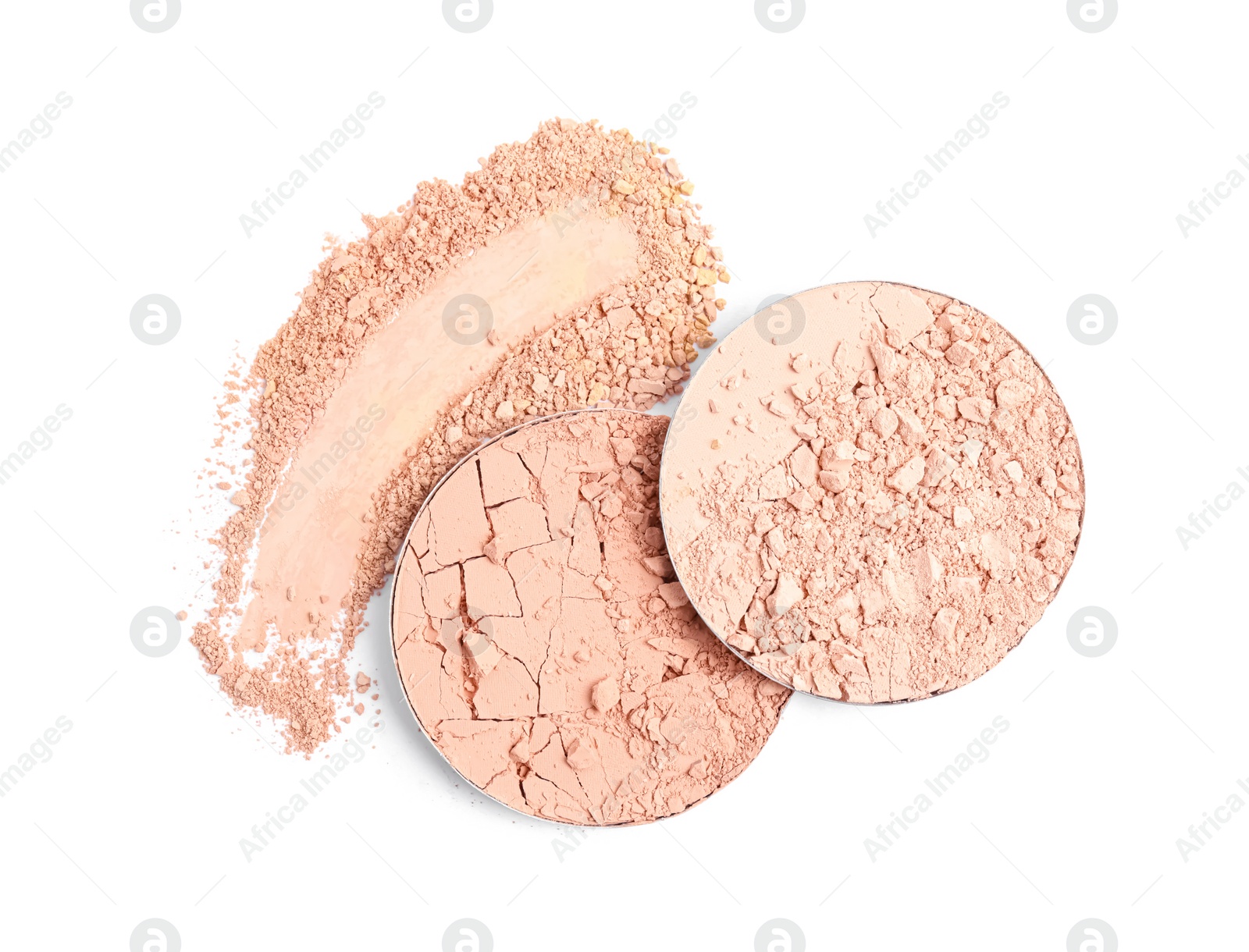 Photo of Different face powders and swatch on white background, top view