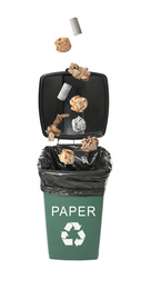 Image of Different paper garbage falling into trash bin. Waste management and recycling