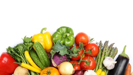 Photo of Many fresh ripe vegetables on white background, top view. Space for text