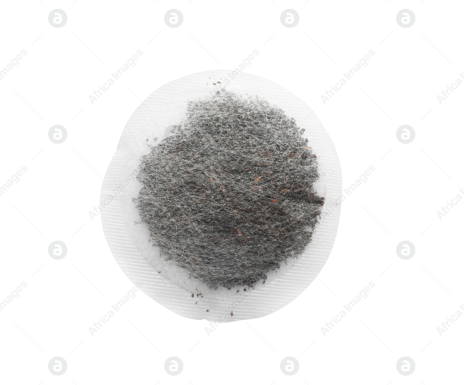 Photo of Unused round tea bag on white background