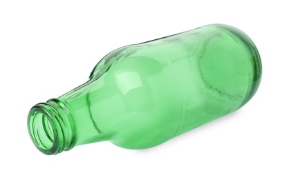 Photo of One empty green beer bottle isolated on white