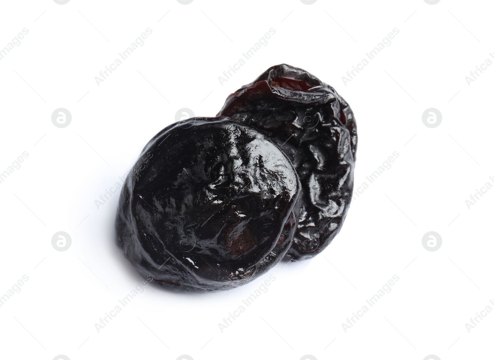 Photo of Tasty prunes on white background. Dried fruit as healthy snack