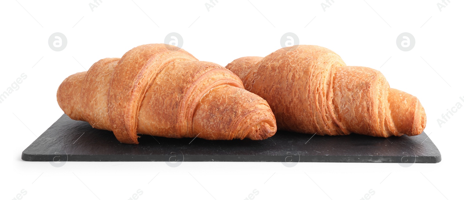 Photo of Tasty fresh crispy croissants isolated on white