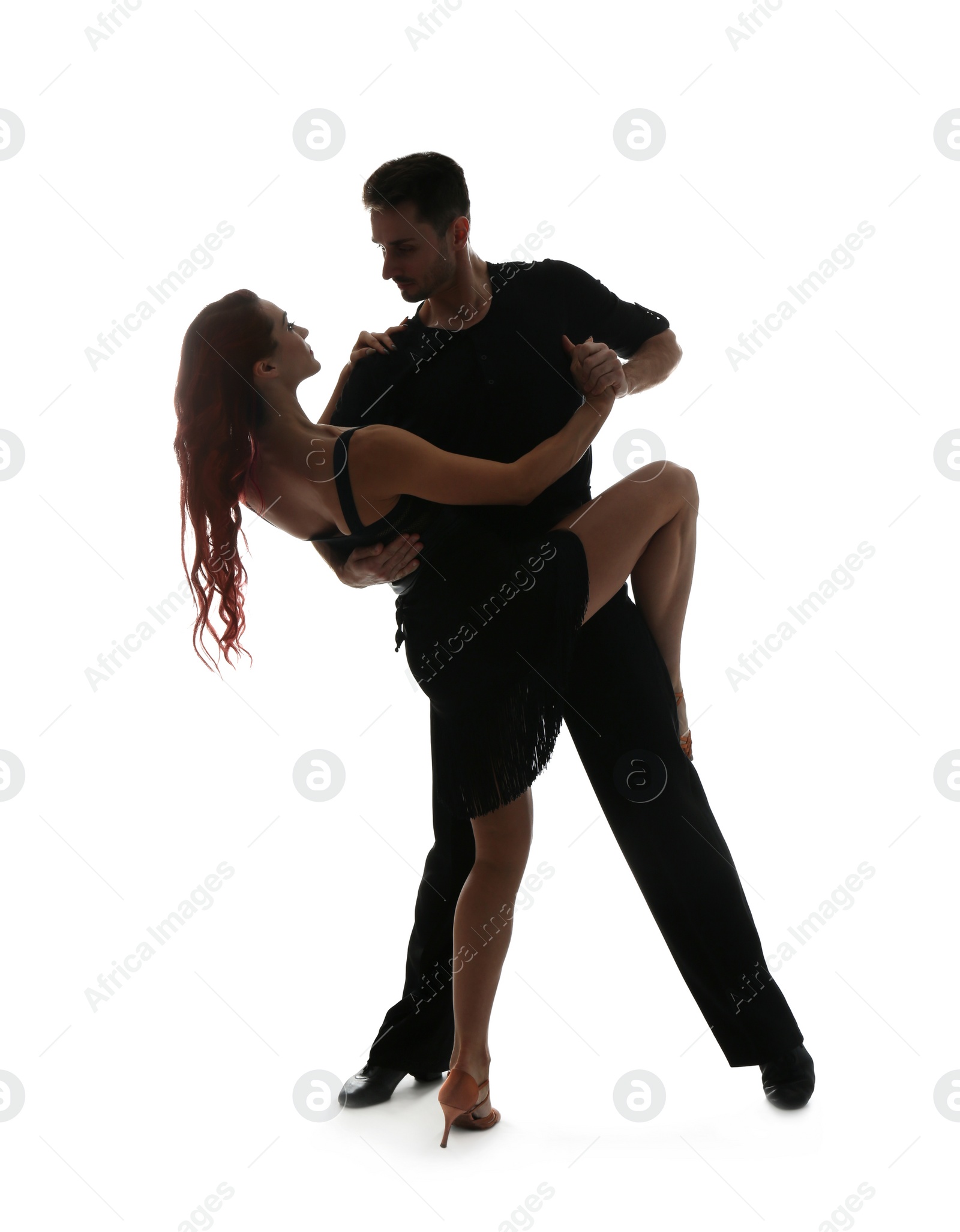Photo of Passionate young couple dancing on white background