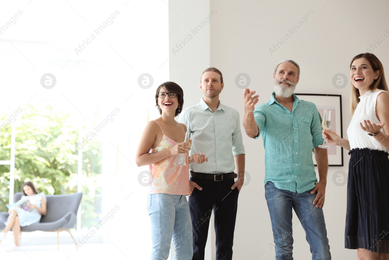 Photo of Group of people at exhibition in art gallery