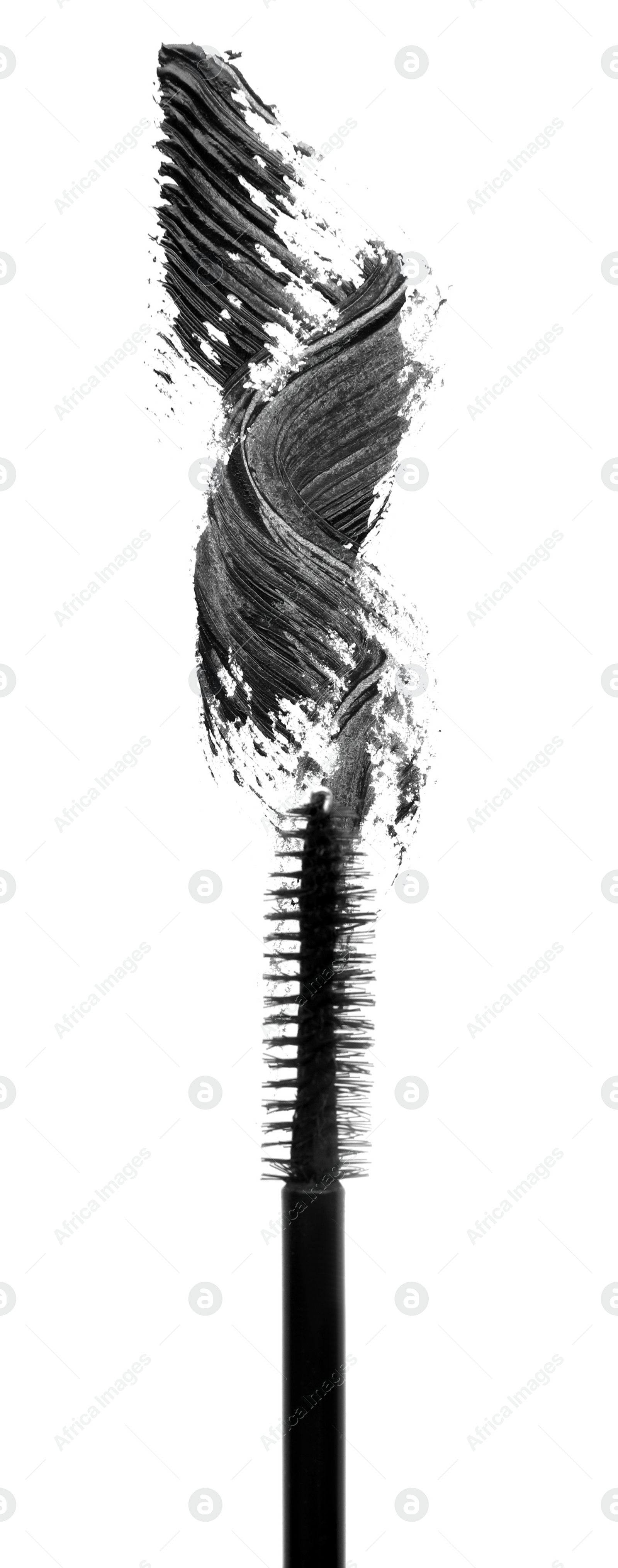 Photo of Applicator and black mascara smear on white background, top view