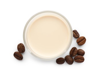Photo of Glass of coffee cream liqueur and beans isolated on white, top view