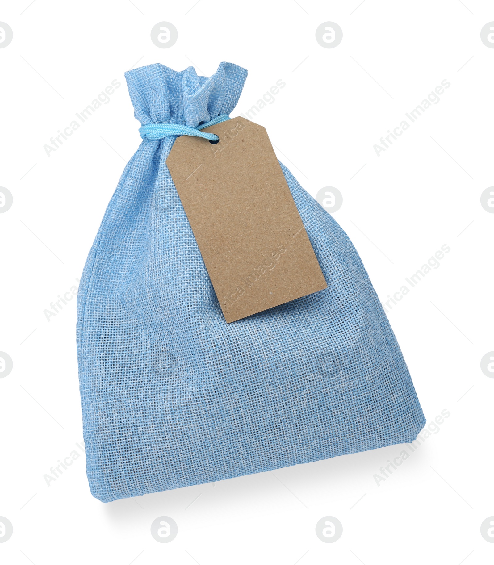 Photo of Light blue burlap bag with tag isolated on white, top view