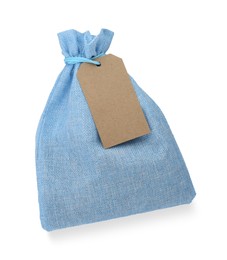 Photo of Light blue burlap bag with tag isolated on white, top view