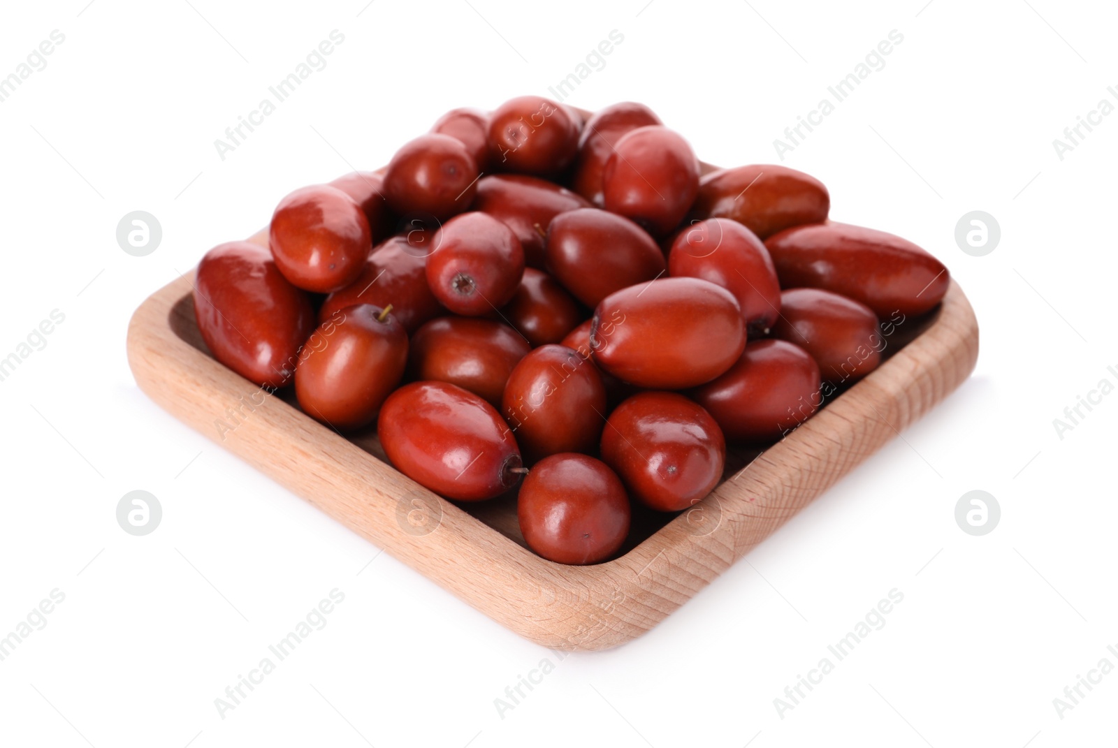 Photo of Wooden plate of ripe red dates on white background