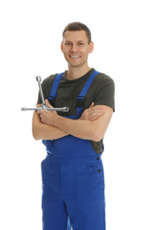 Photo of Portrait of professional auto mechanic with lug wrench on white background