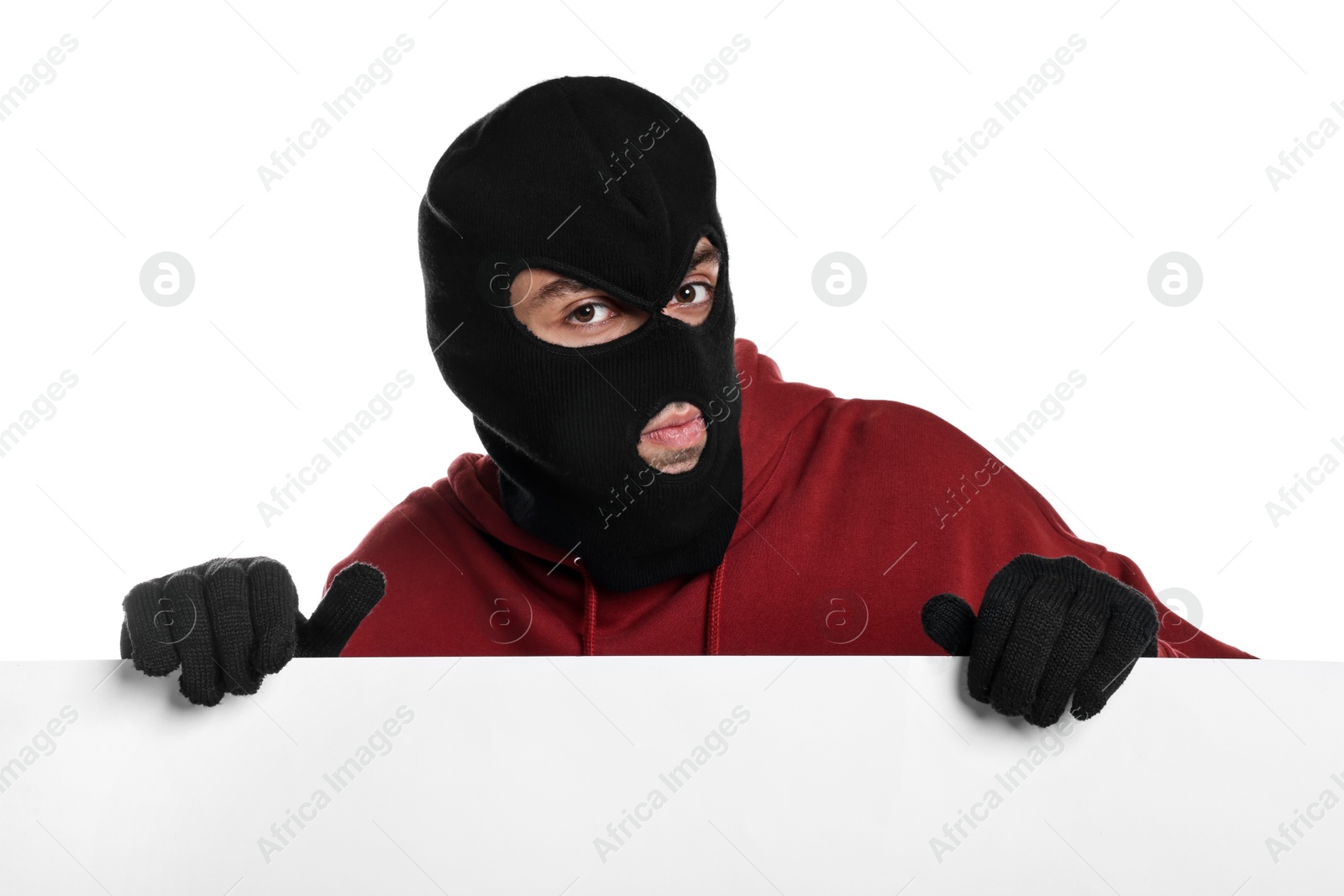 Photo of Thief in balaclava and gloves on white background