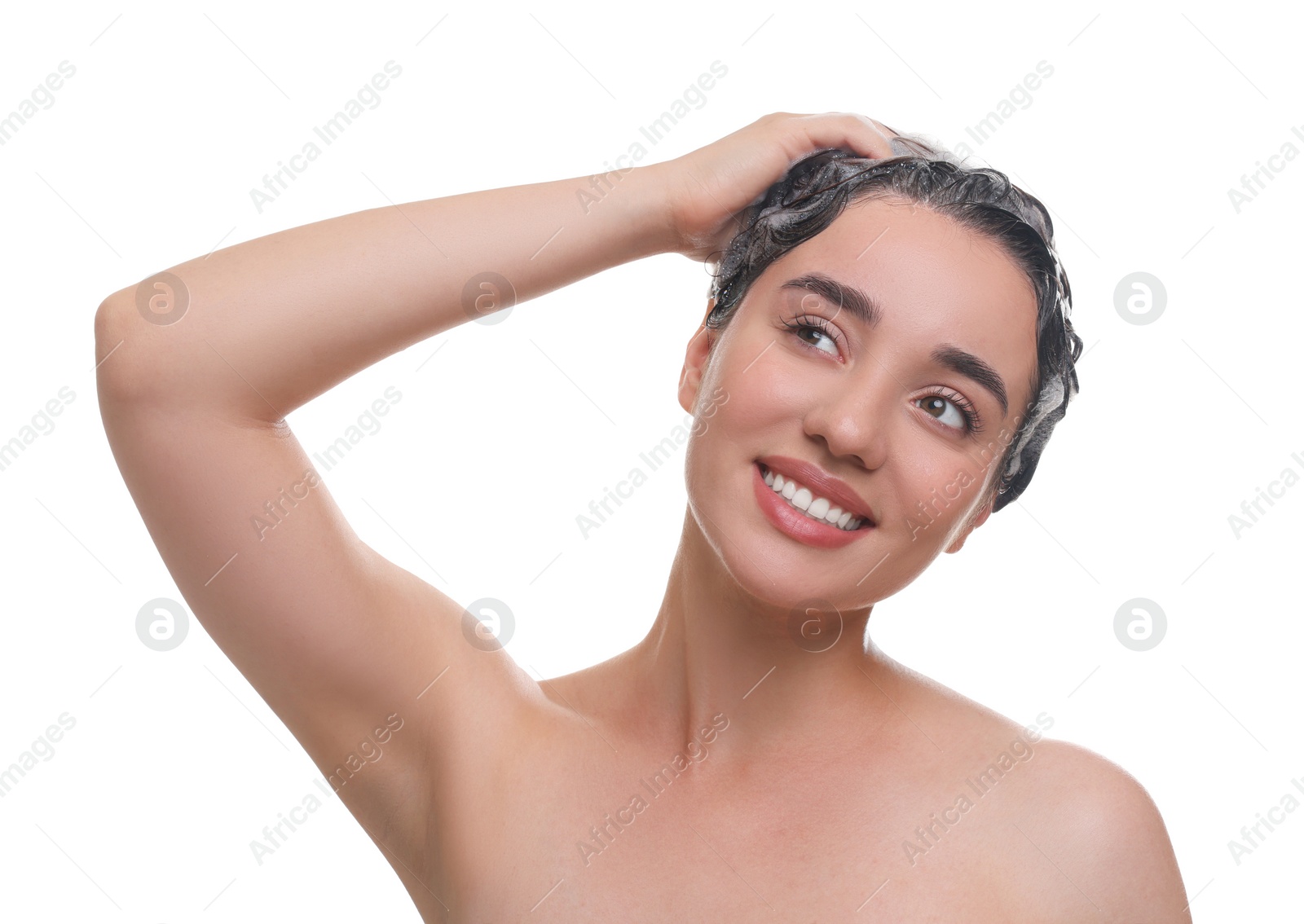 Photo of Beautiful happy woman washing hair on white background