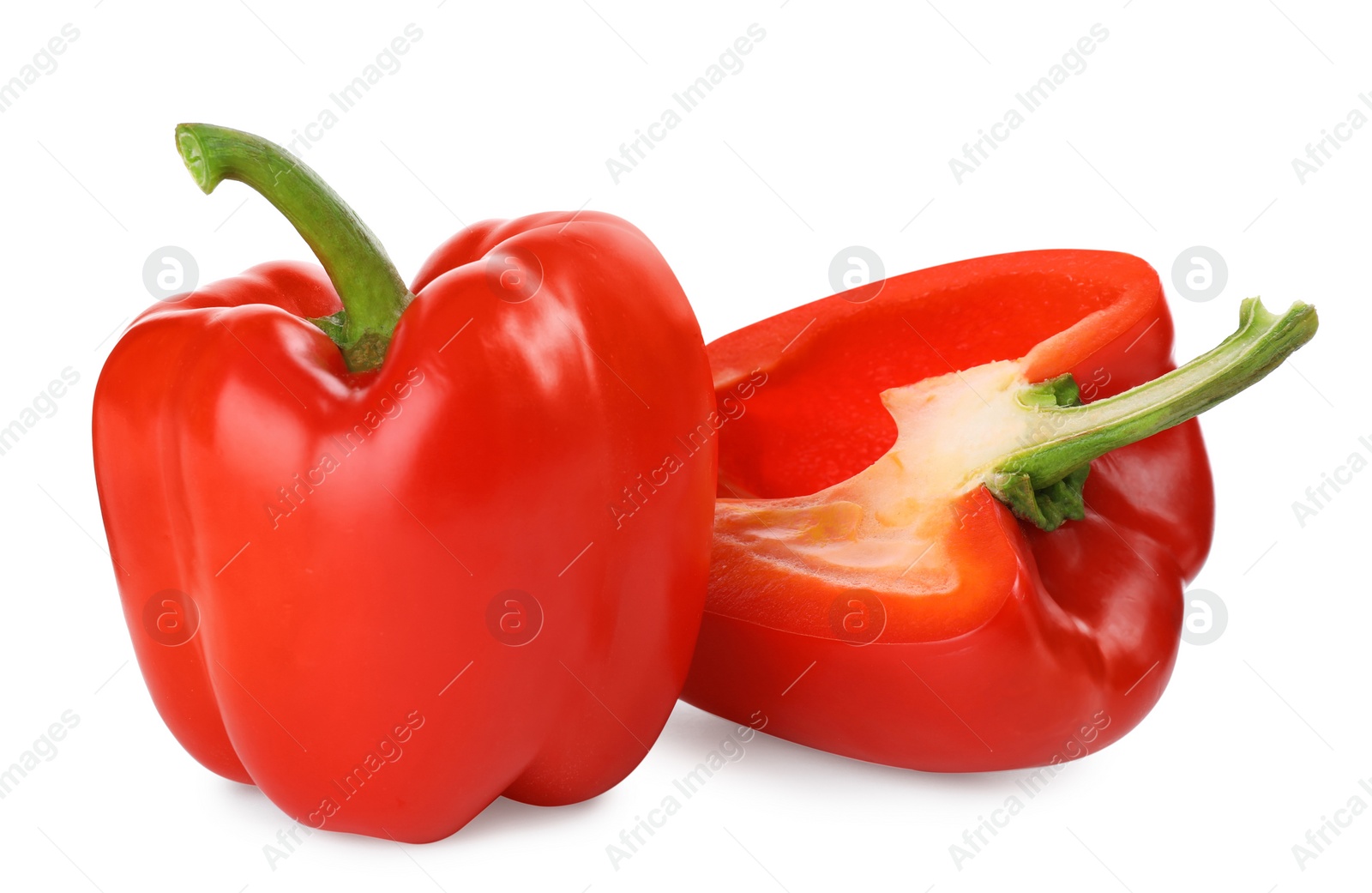 Photo of Tasty ripe red bell peppers isolated on white