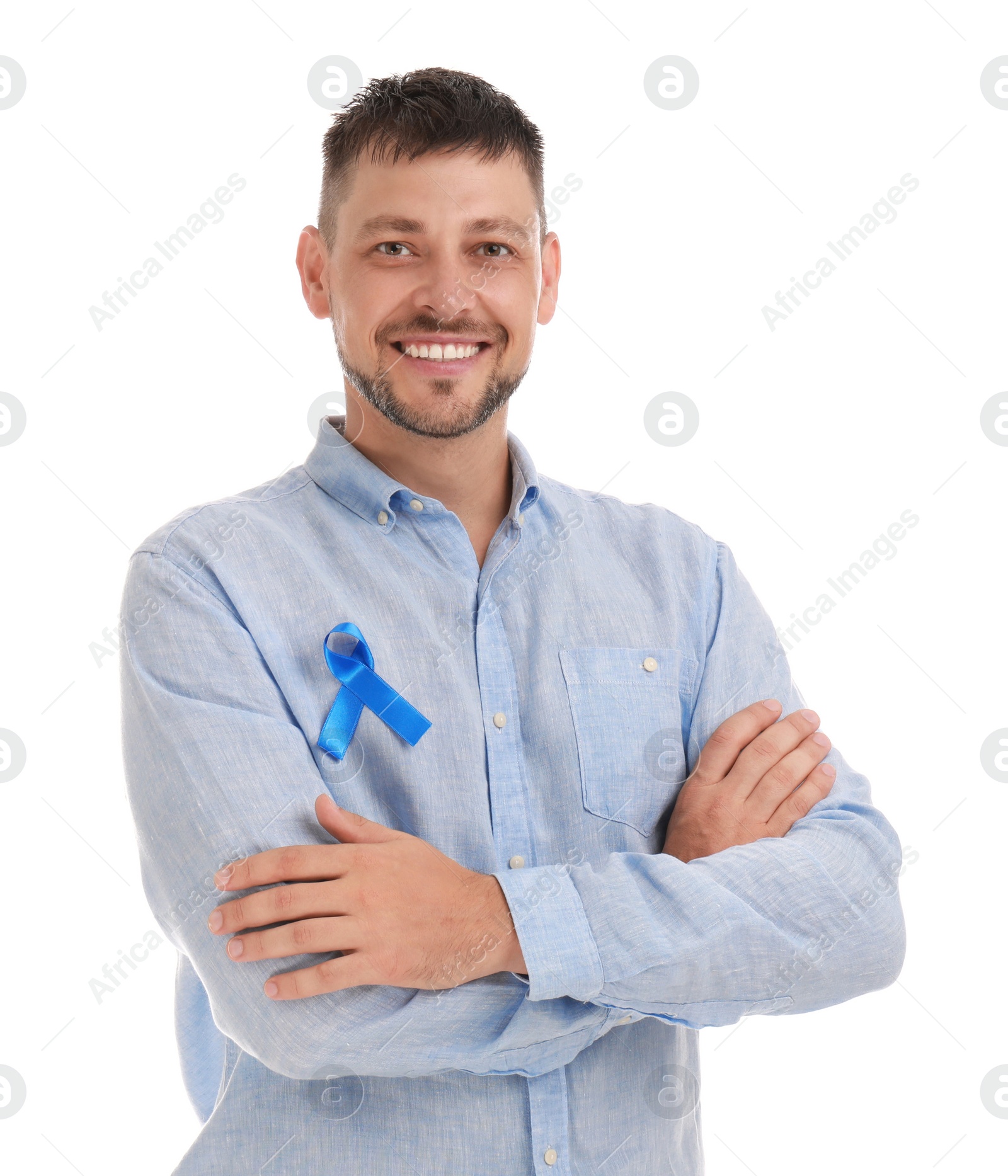Photo of Man with blue ribbon on white background. Urology cancer awareness