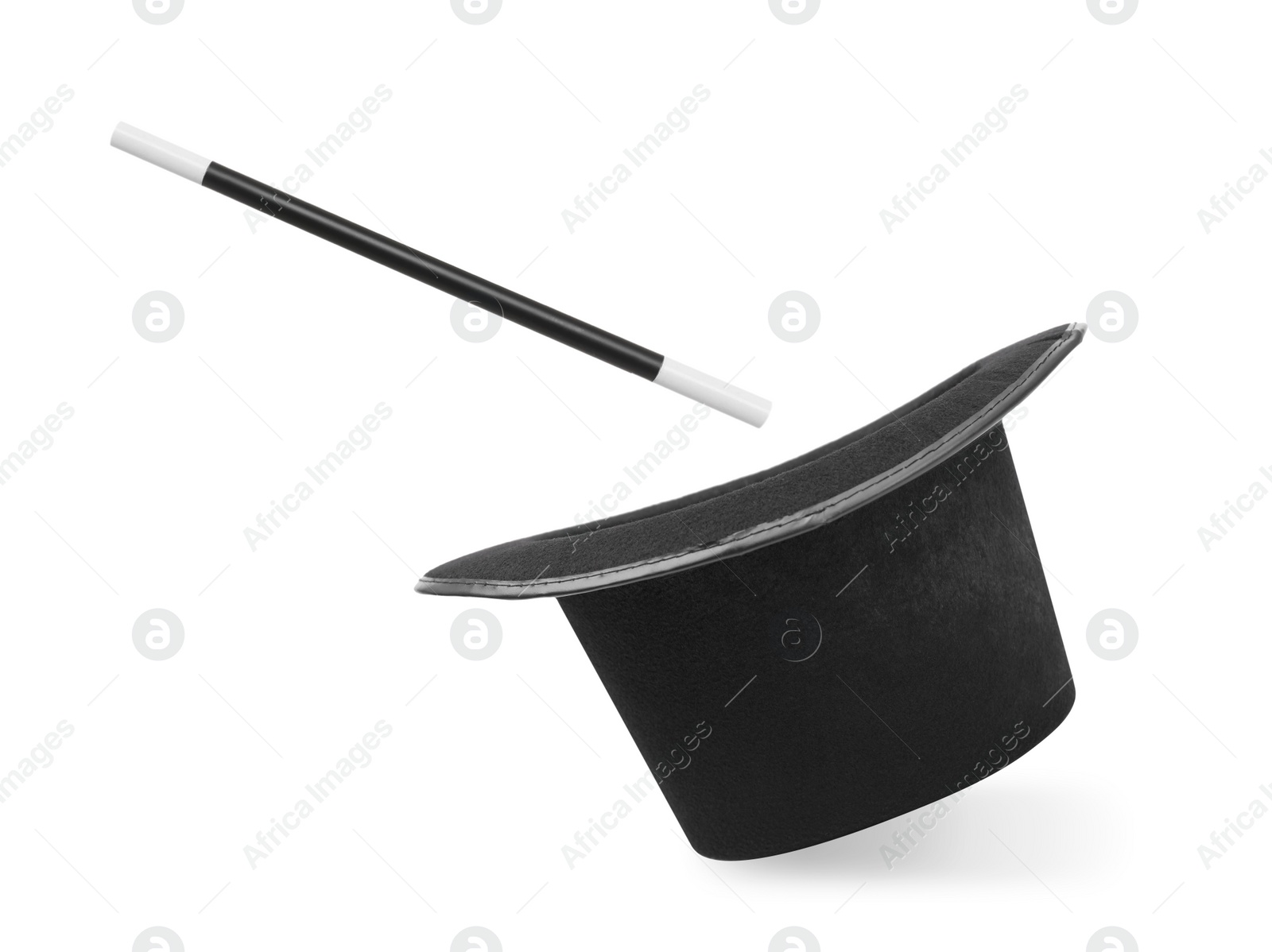Image of Magic wand and top hat isolated on white. Magician trick