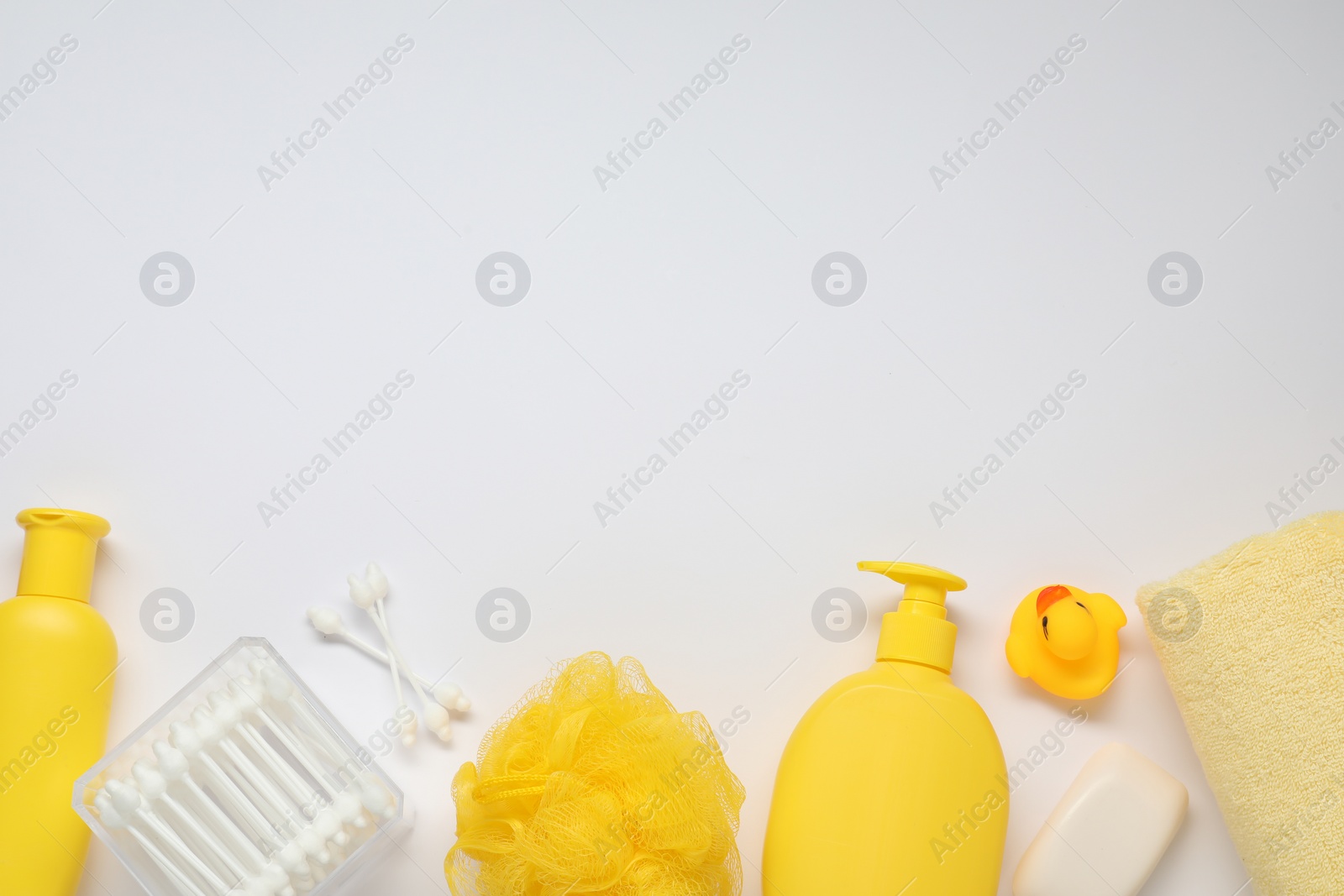 Photo of Baby bath accessories and care products on white background, flat lay. Space for text