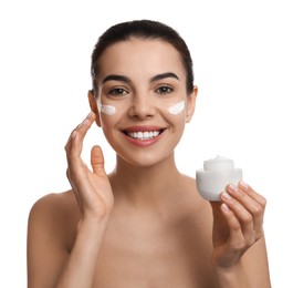 Photo of Young woman applying facial cream on white background